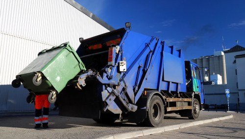 Professional house clearance team in South London removing furniture