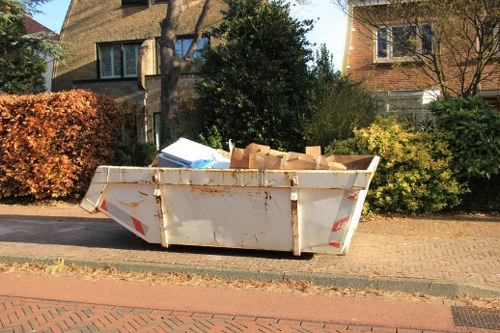 Sofa being carefully removed from a home